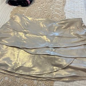 Adorable gold metallic tennis skirt!